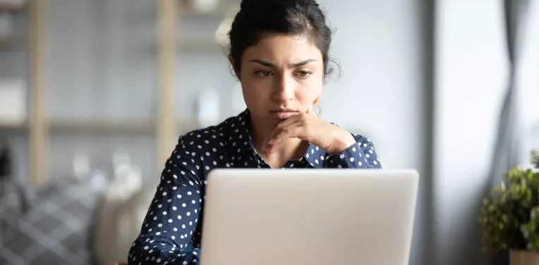 Woman working at a laptop